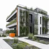 Végétalisation des façades et toitures : techniques, coûts et bénéfices pour les bâtiments neufs